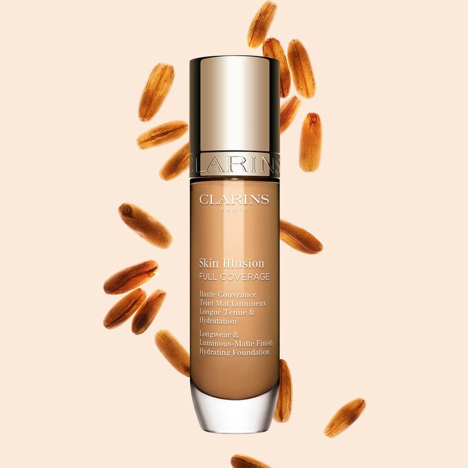 Clarins Skin Illusion Full Coverage, joka esittelee tyylikk&auml;&auml;n muotoilunsa ja n&auml;ytt&auml;v&auml;n pakkauksensa &ndash; t&auml;ydellinen meikkivoide virheett&ouml;m&auml;&auml;n ja luonnolliseen ihons&auml;vyyn.