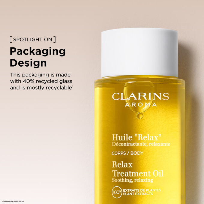 Clarins Relax Body Treatment Oil pullo ja kamomillan kukkia, koostumus sis&auml;lt&auml;&auml; 100 % kasviuutteita.