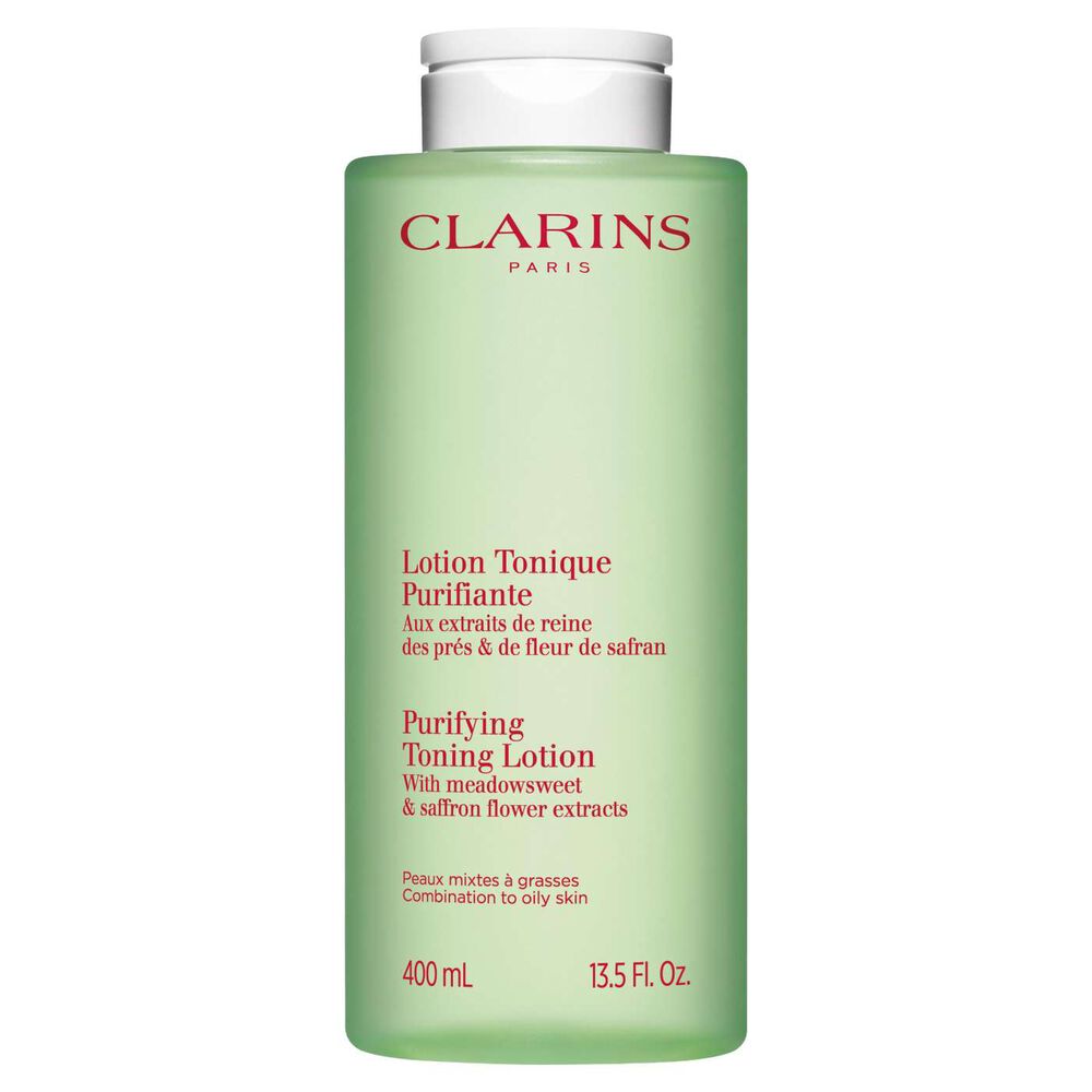 Packshot vihre&auml;st&auml; Clarinsin puhdistavan kasvoveden pullosta, jossa on tasapainottava vaikutus, valkoista taustaa vasten.