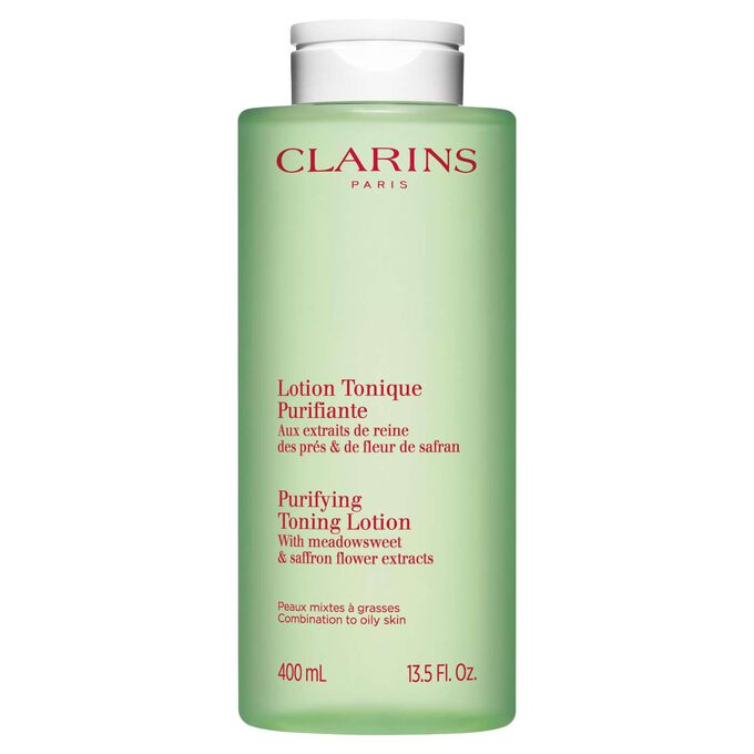 Packshot vihre&auml;st&auml; Clarinsin puhdistavan kasvoveden pullosta, jossa on tasapainottava vaikutus, valkoista taustaa vasten.